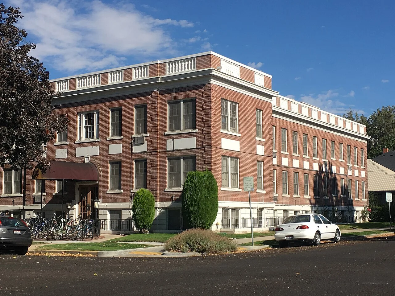 Brick facade and windows of Wellman Apartments in Boise