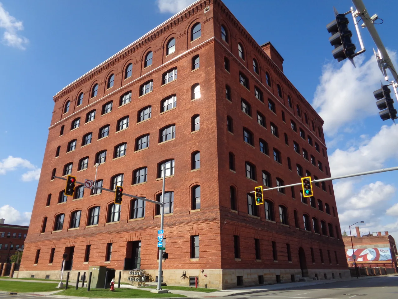 Large red brick Standard Lofts apartment building in downtown Toledo