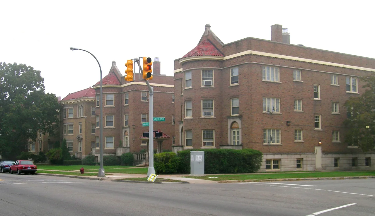 Brick apartment buildings with corner turrets on McNichols in Detroit’s Palmer Park Boulevard district
