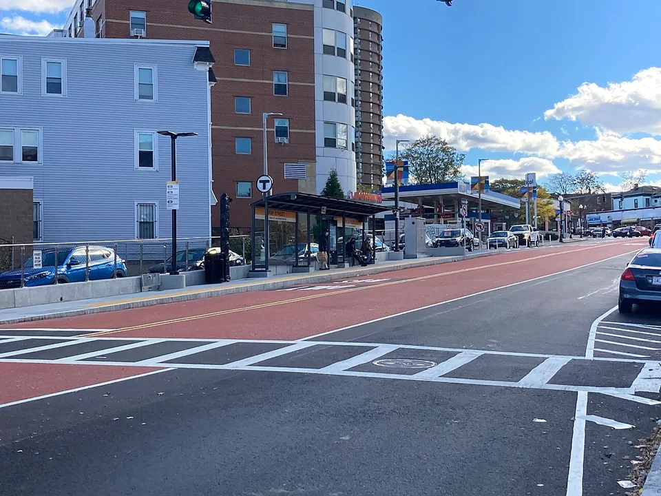 Bus platform and neighboring residential buildings at Bray Street in Boston.
