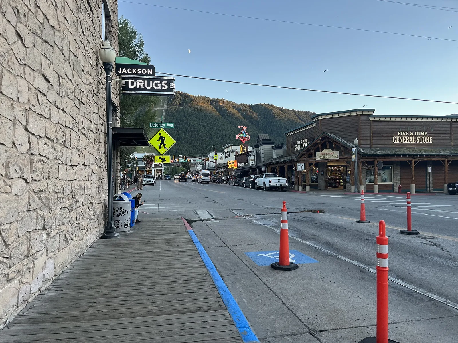 Downtown Jackson storefronts with hills in the background